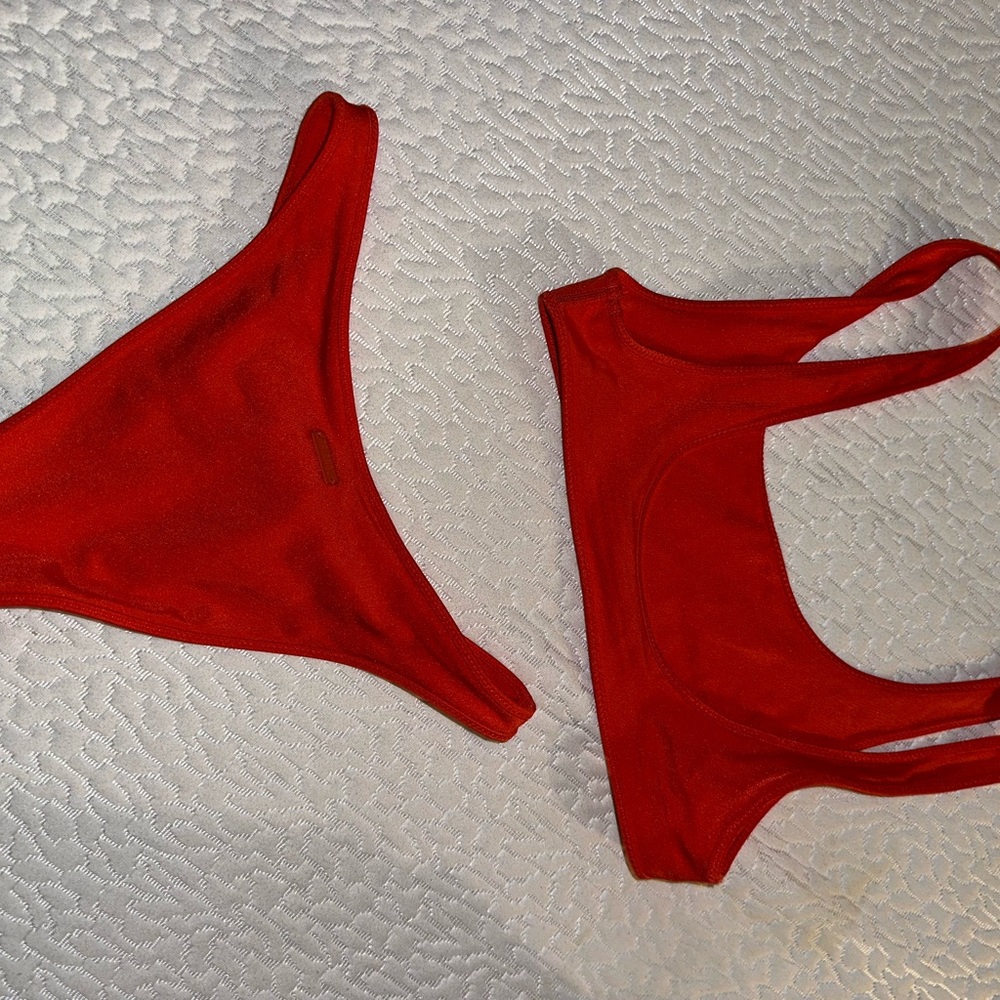 Triangl bikini set. Bright orange. Top size L, bottom size M.